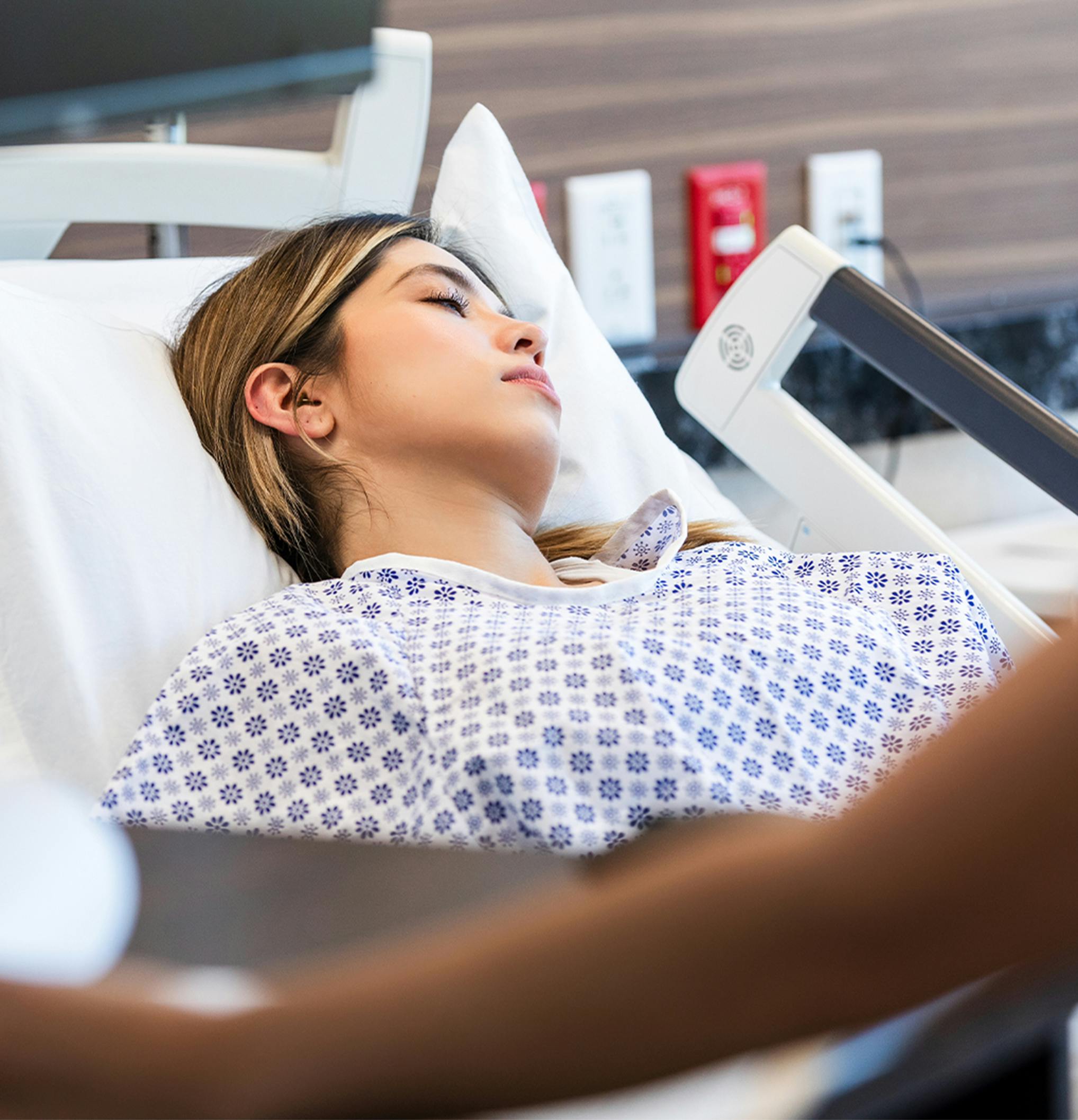 woman laying in a hospital bed