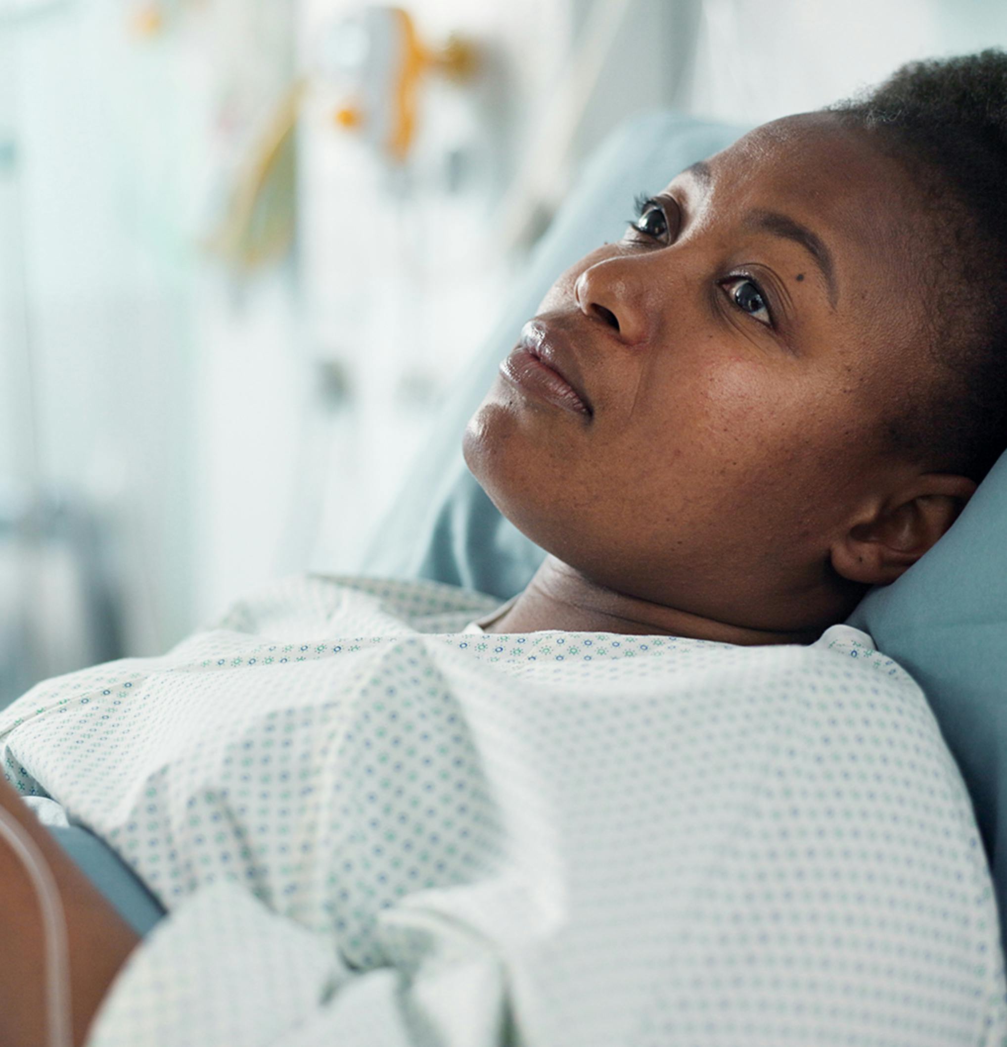 woman laying in a hospital bed