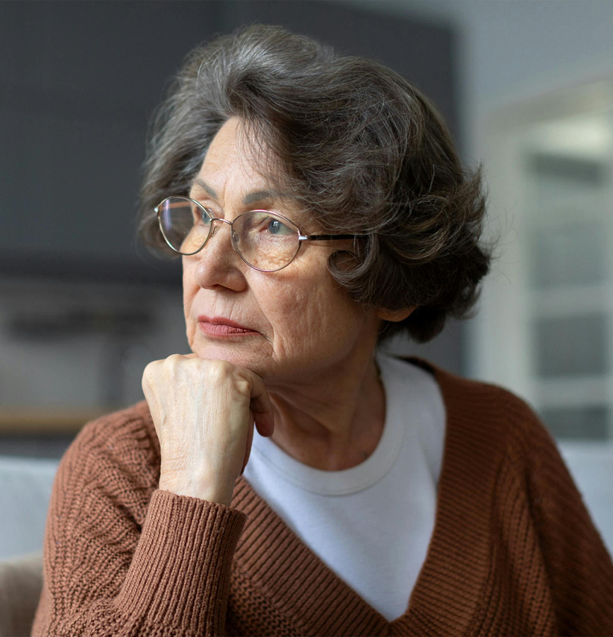 Older woman looking off into the distance