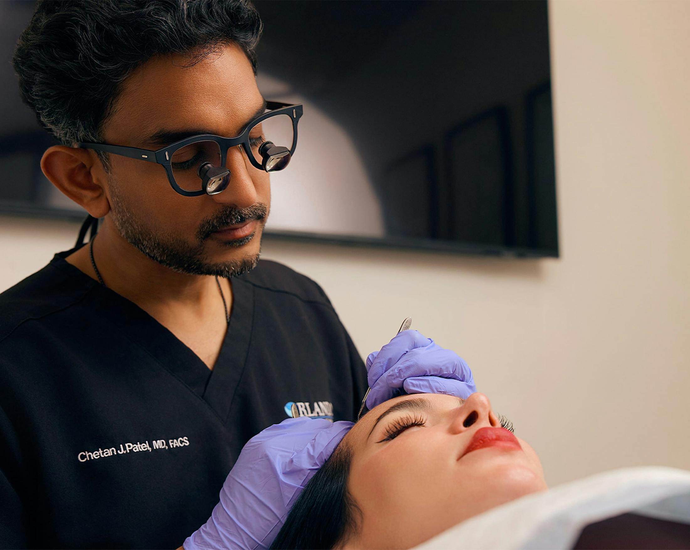 doctor looking at patients head