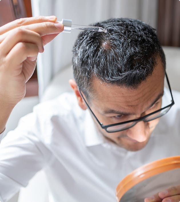 Man using hair Vitamins & Medications