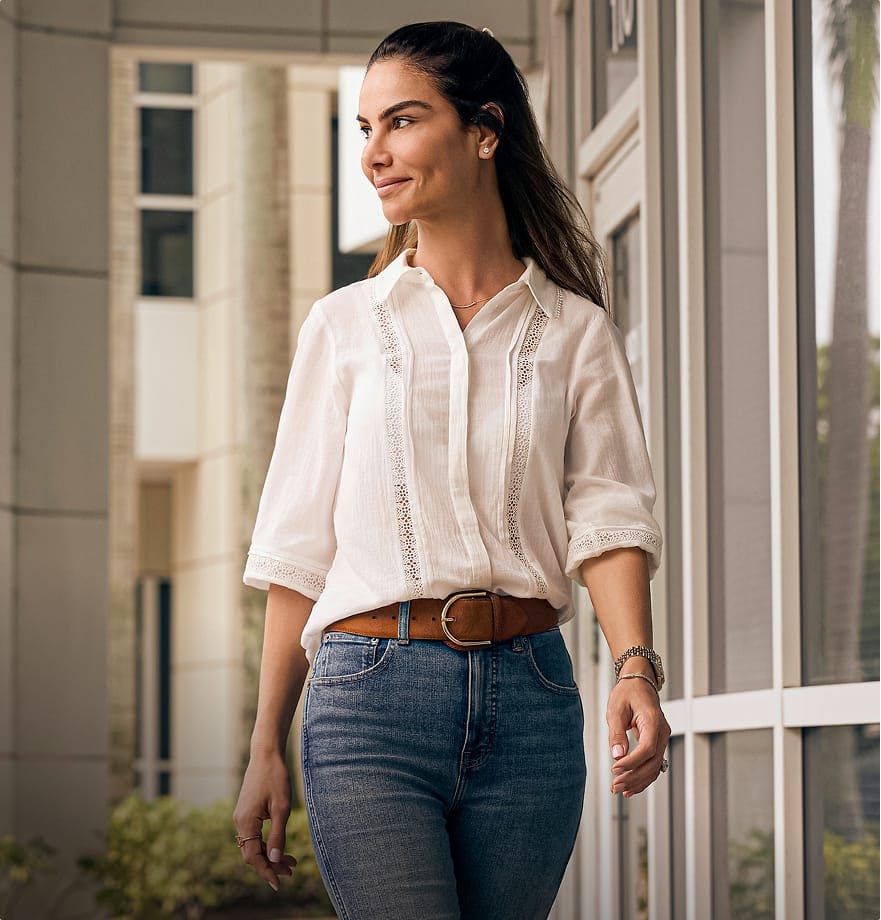 woman in white shirt and jeans