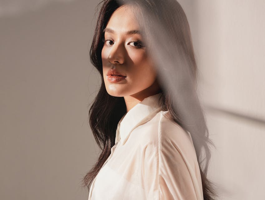 woman looking over her shoulder