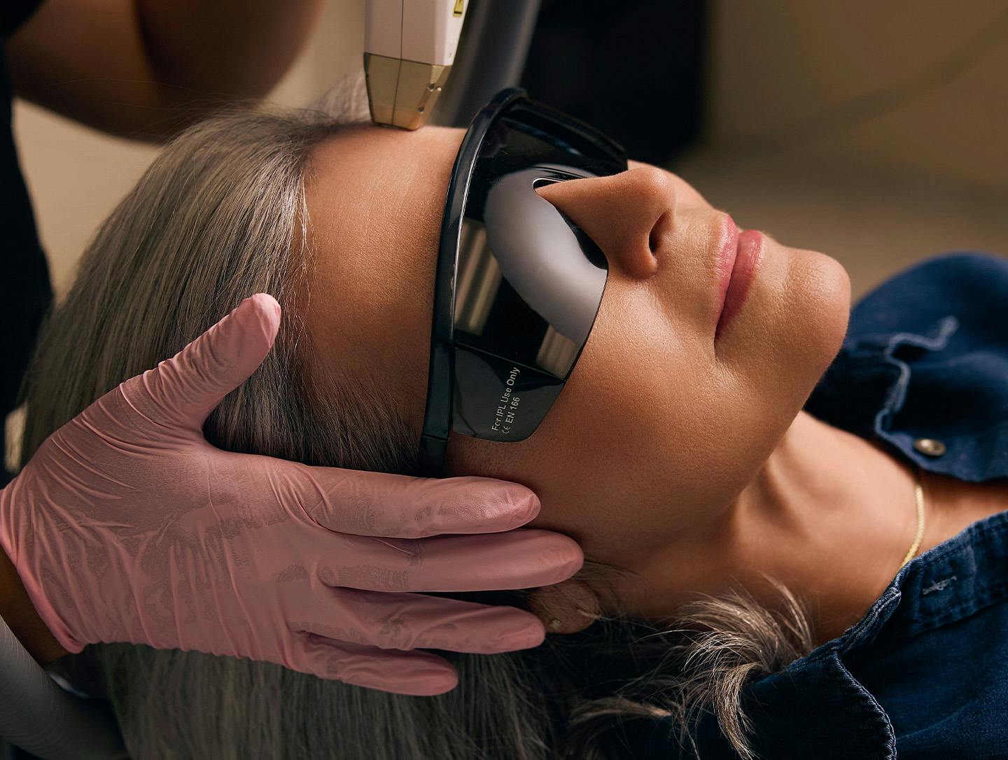 woman getting laser treatment on her face