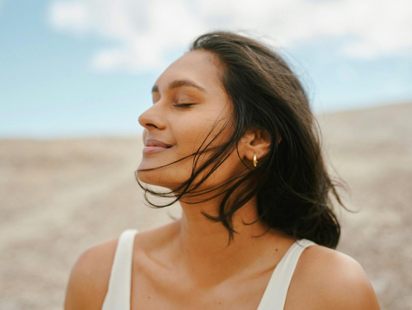 woman closing her eyes
