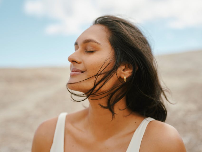 woman closing her eyes