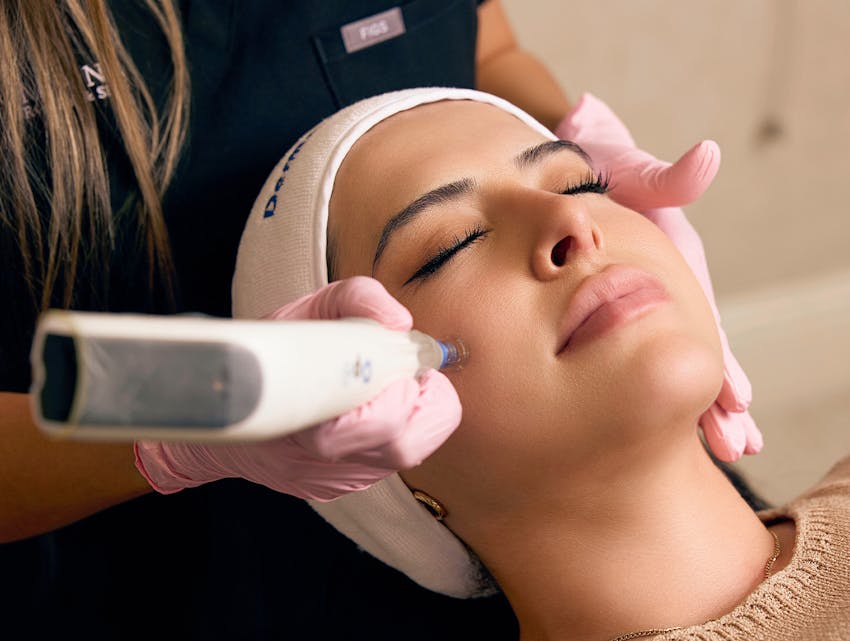woman getting laser treatment on her face