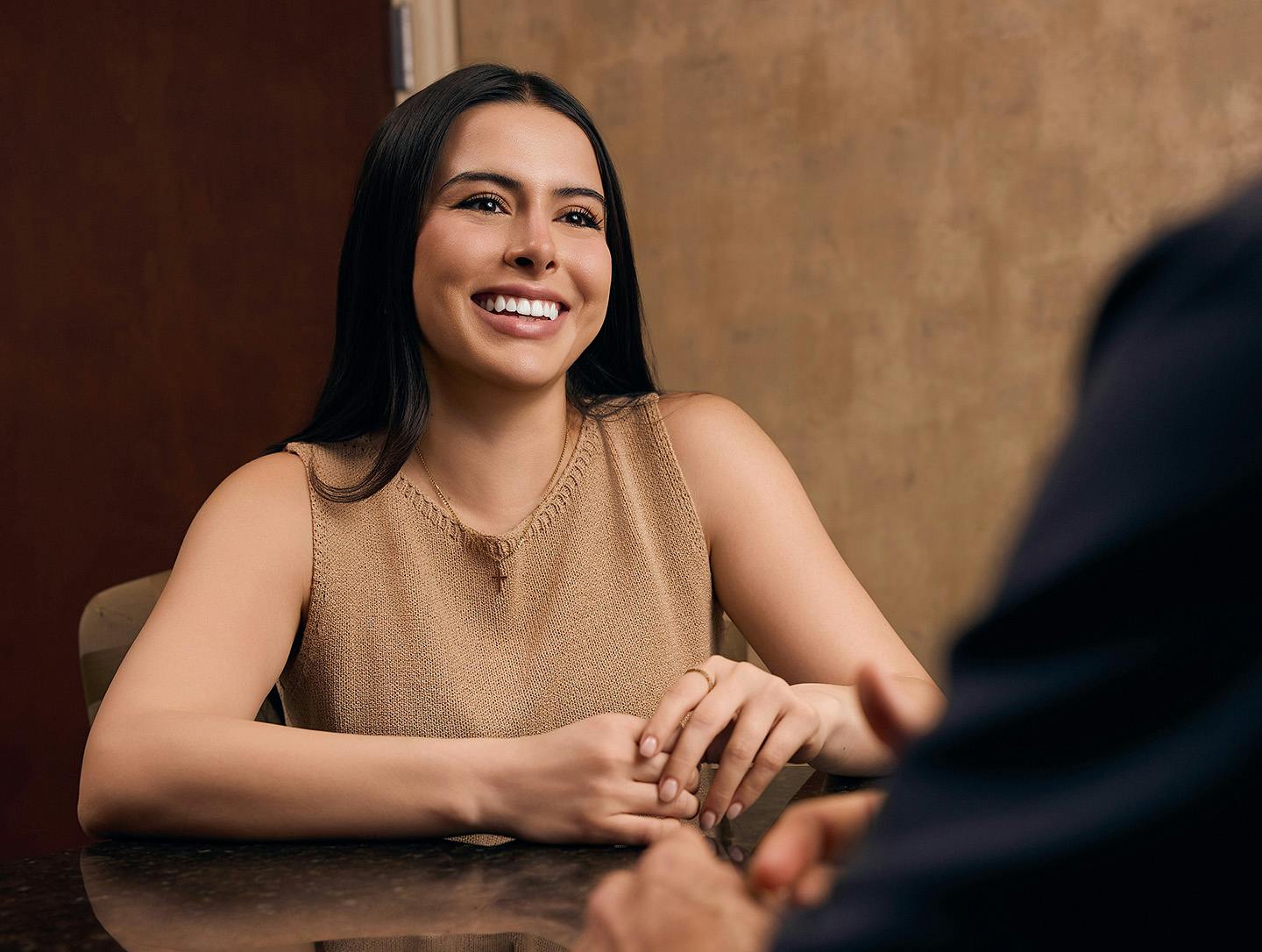 woman smiling at the doctor