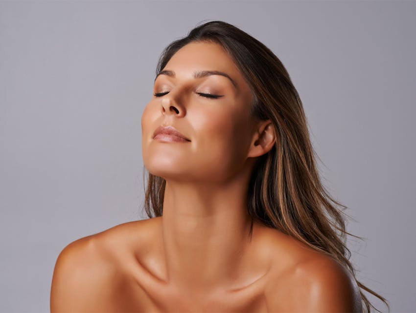 woman closing her eyes