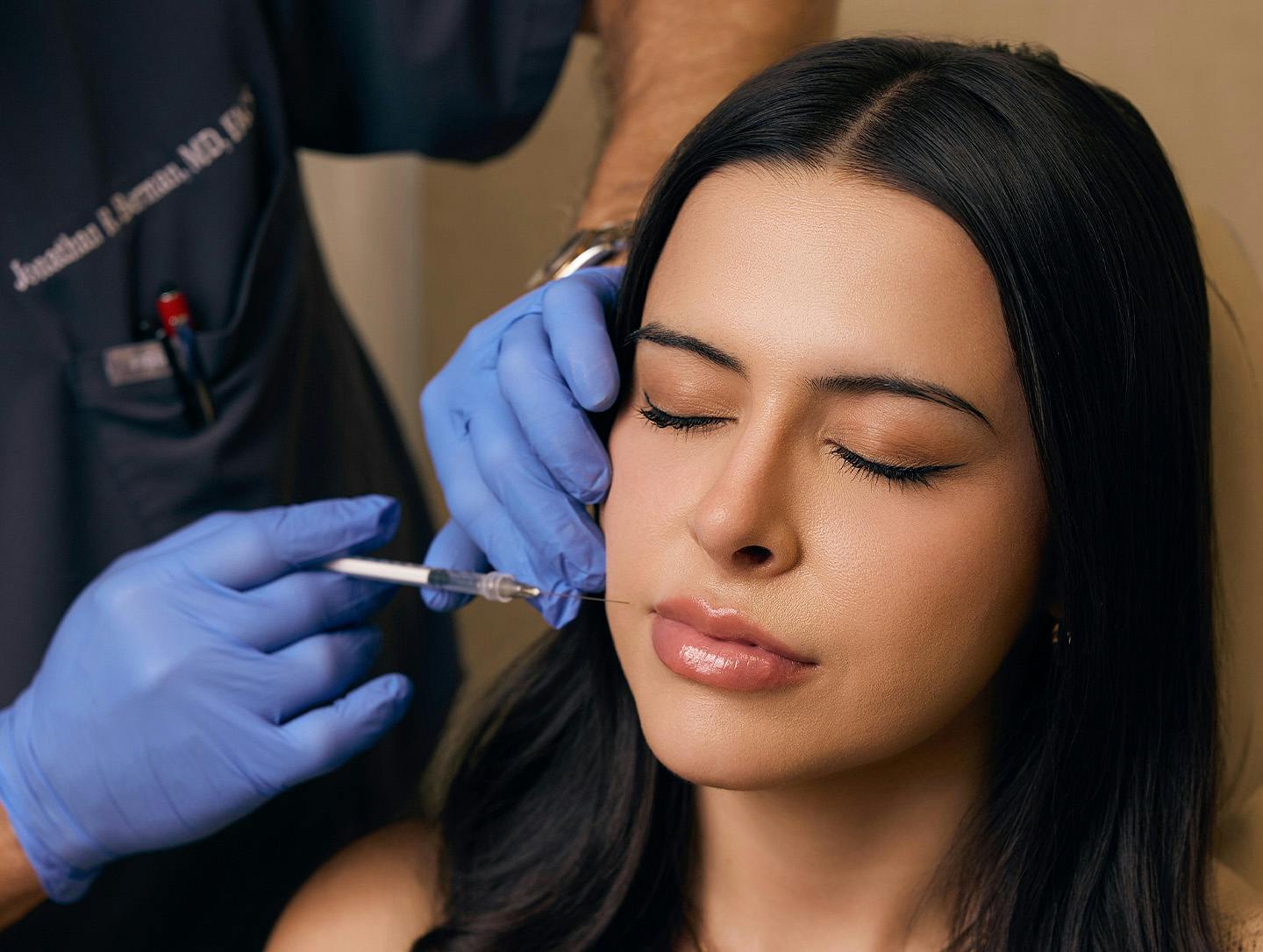 woman getting lip filler done