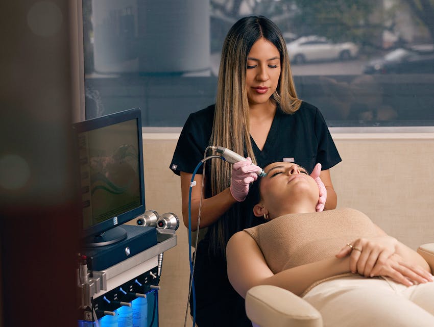 woman getting facial treatment