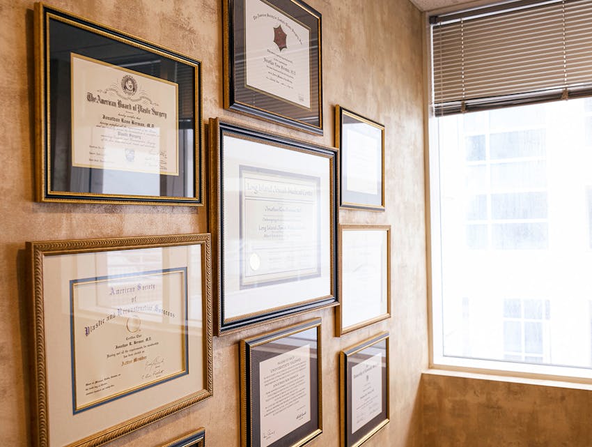 the doctors awards and certificates on the wall