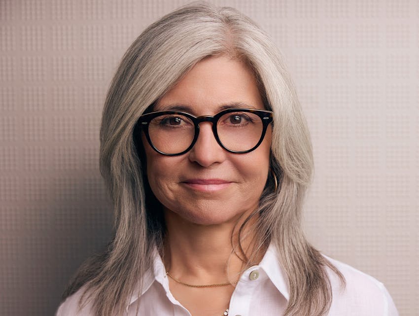woman smiling into the camera