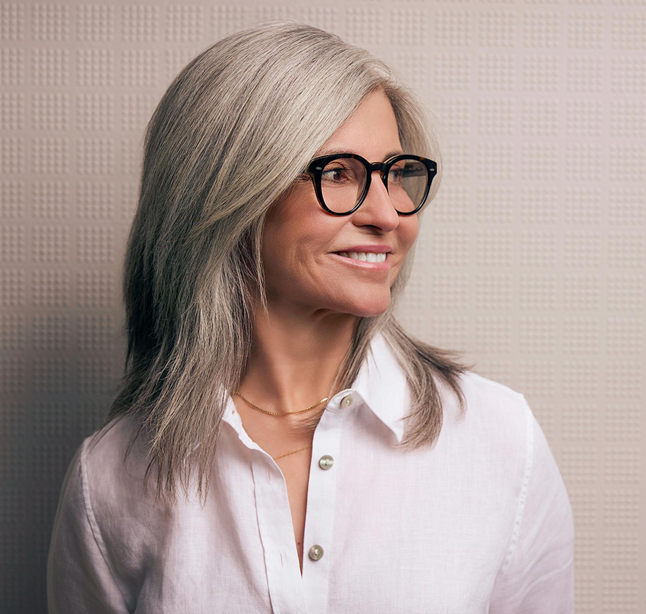 woman looking to the side, smiling