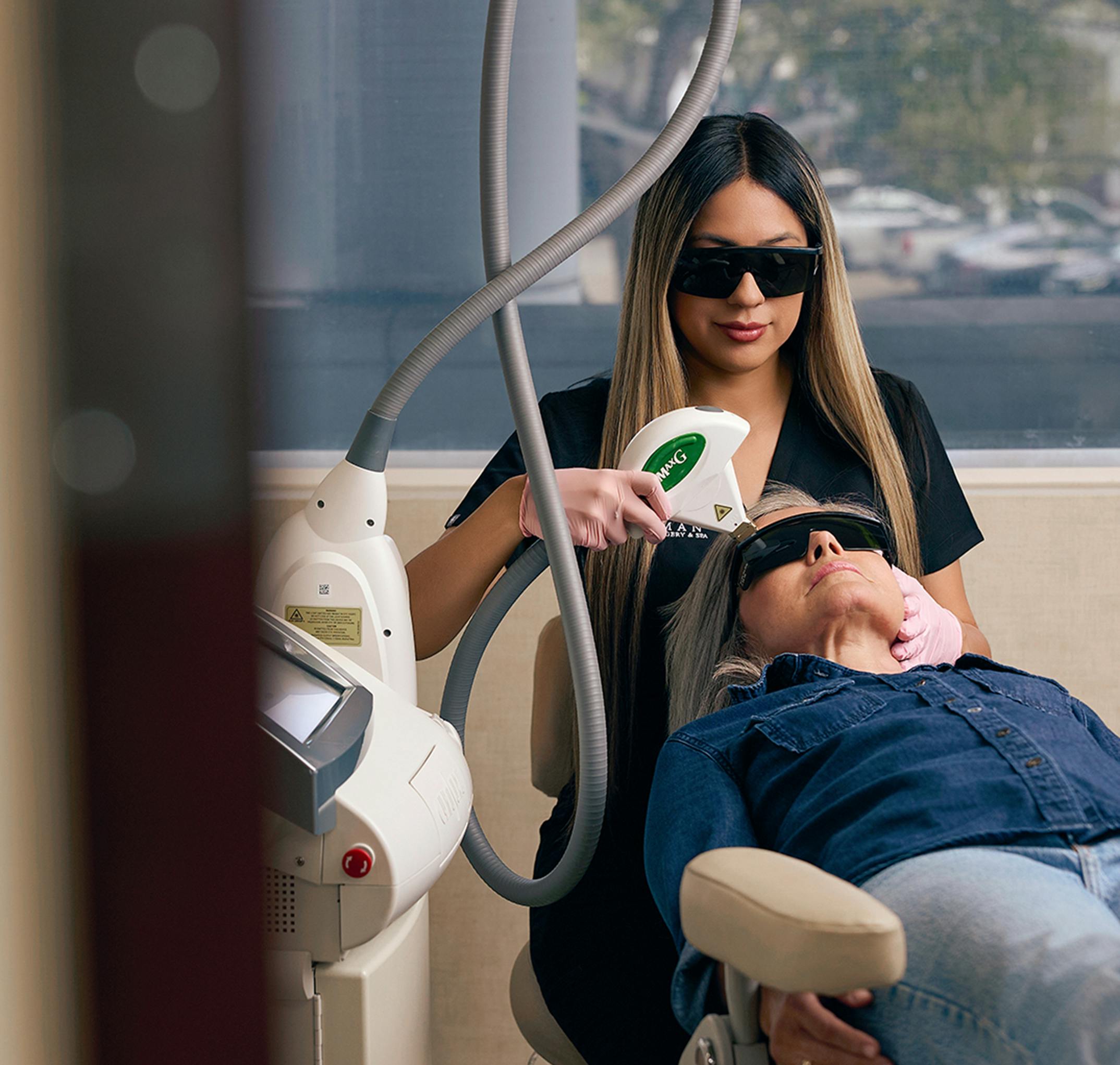 woman getting laser treatment on her face