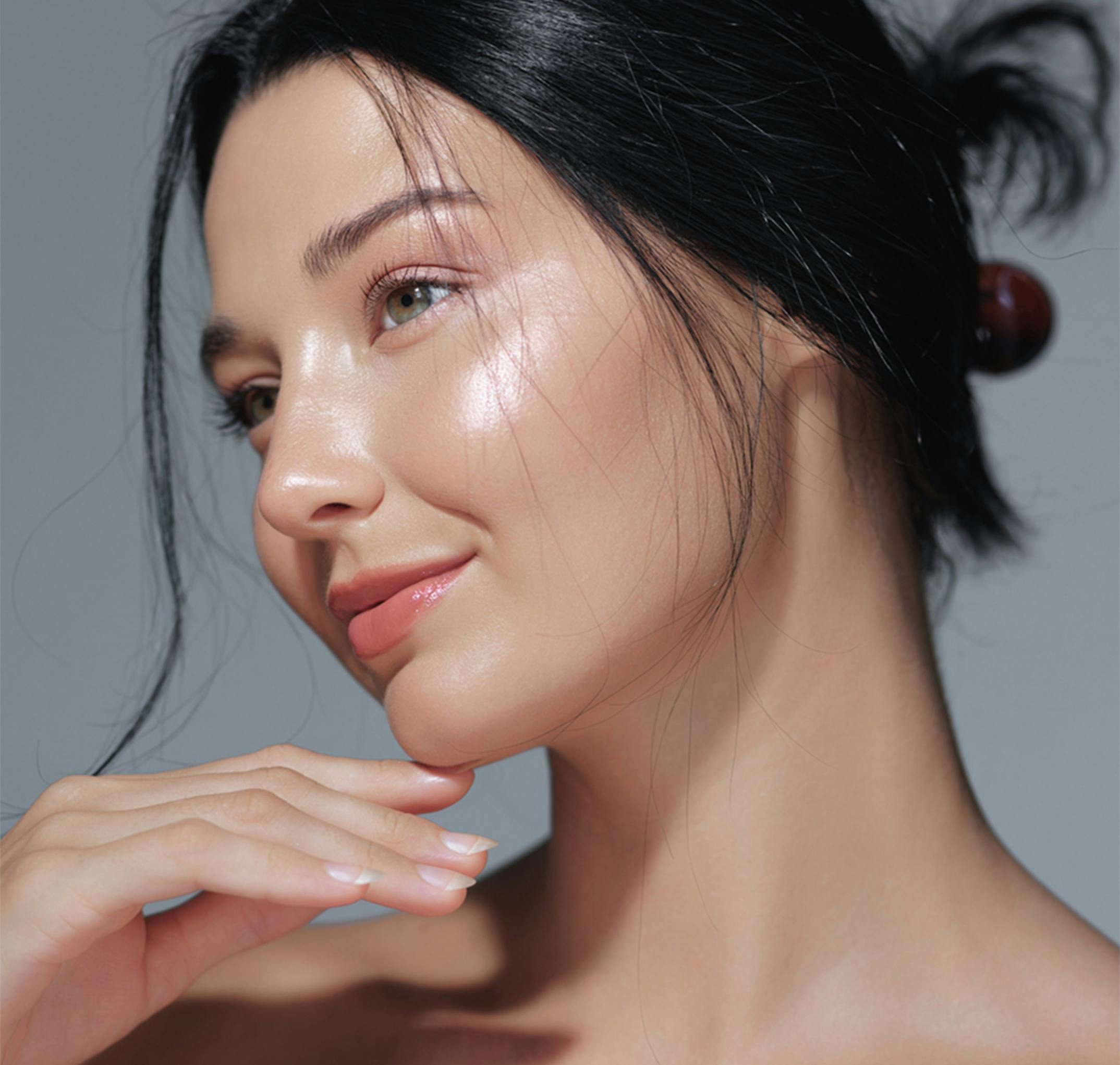 woman touching her chin