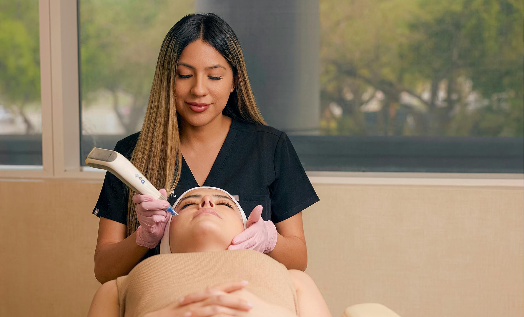 woman receiving facial treatment