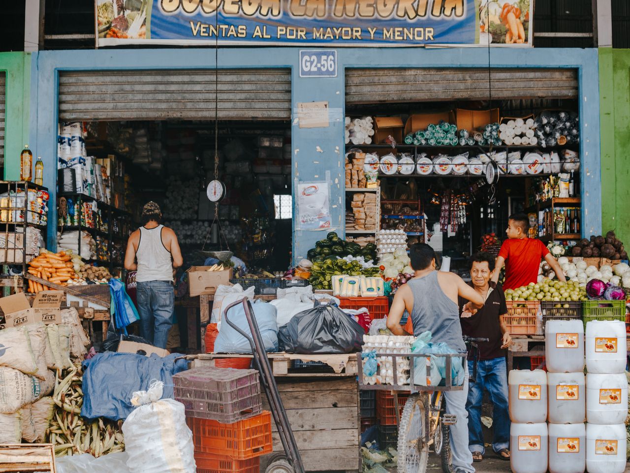 People shopping at a market in Honduras.