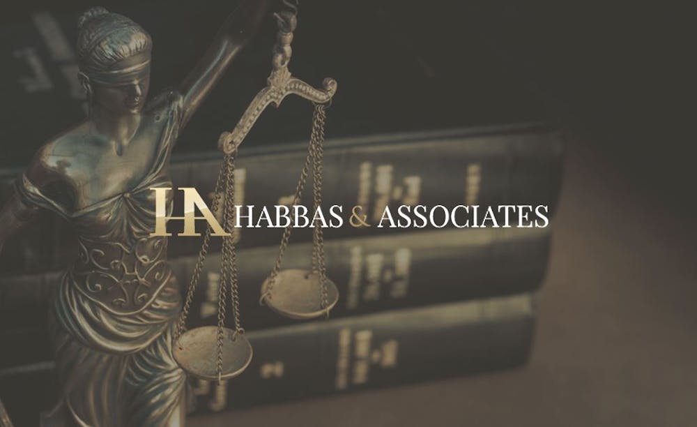 Lady Justice Scales and Law Books