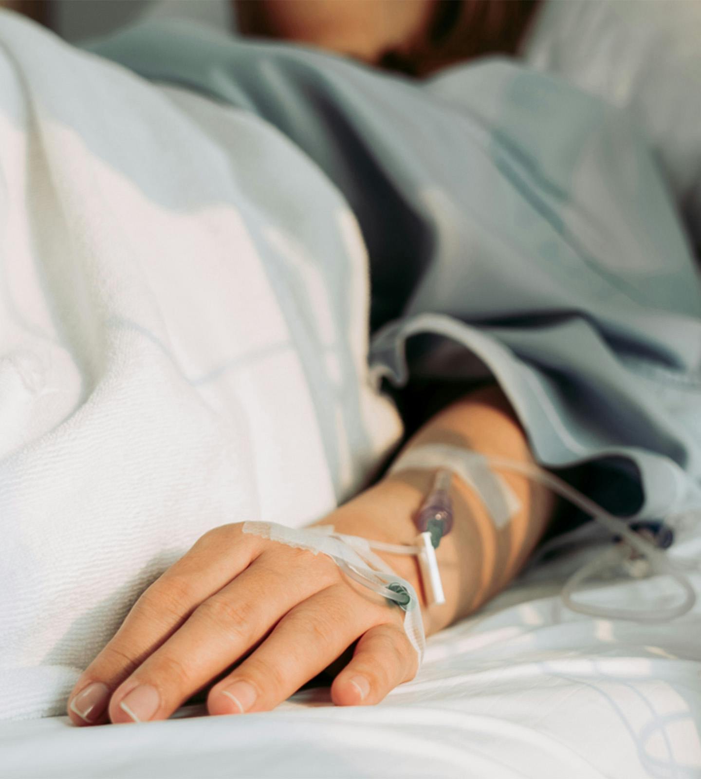 person laying in a hospital bed