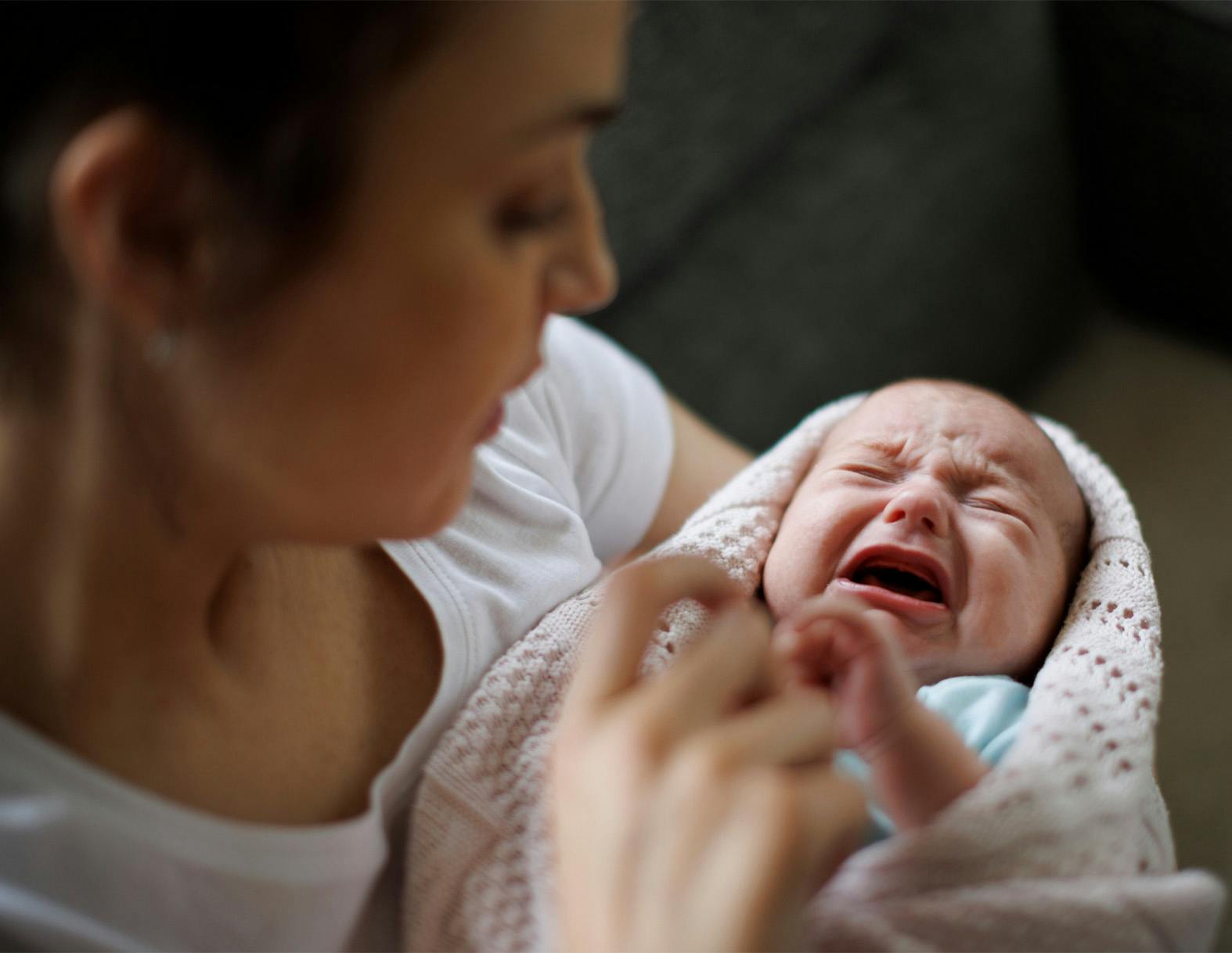 Woman holding a baby