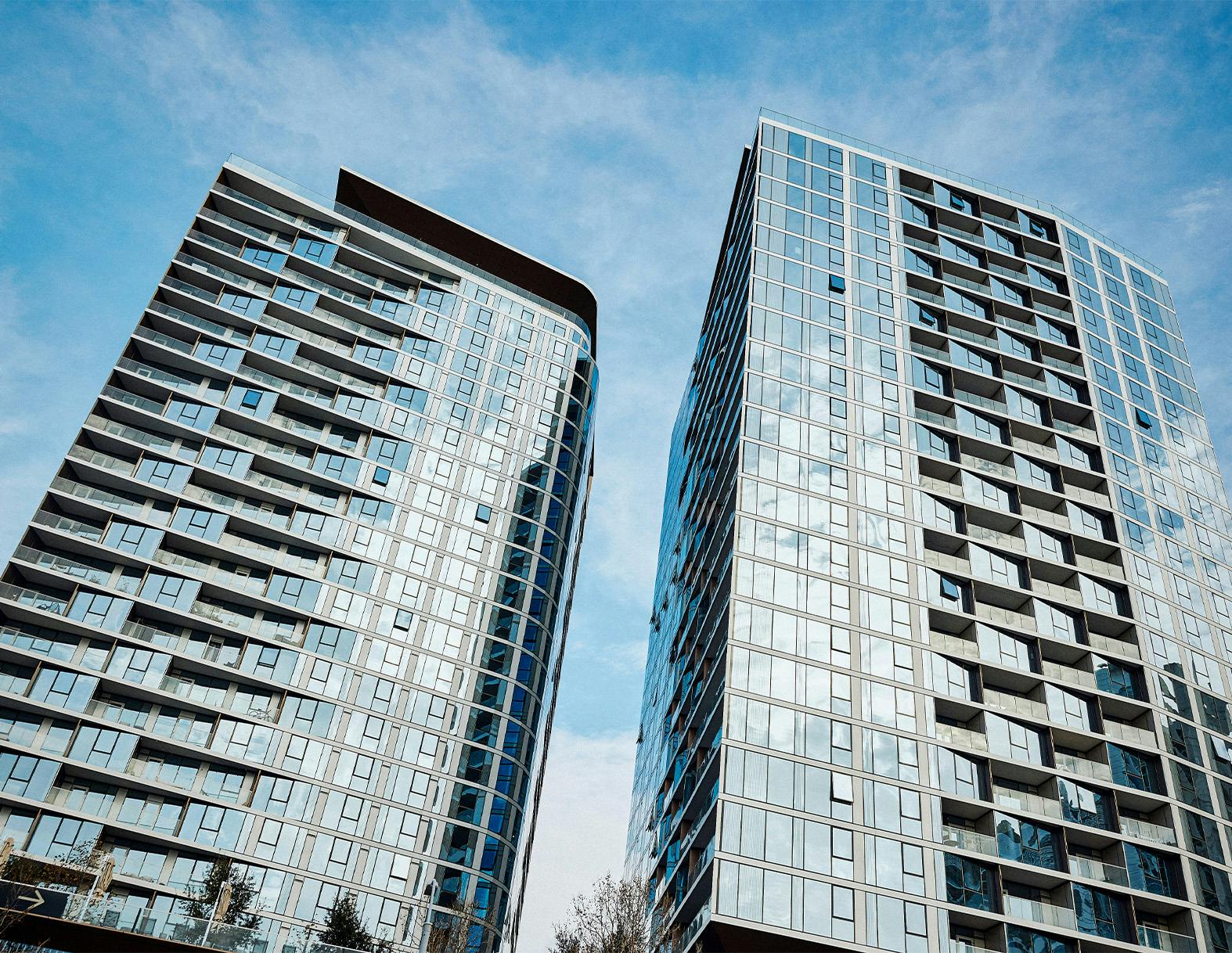 two glass buildings