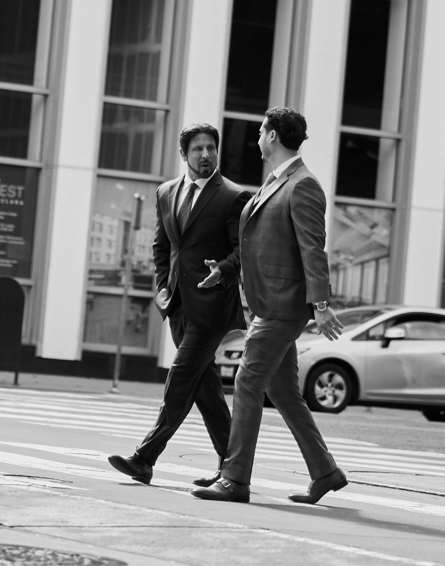 Habbas Law attorneys walking in street