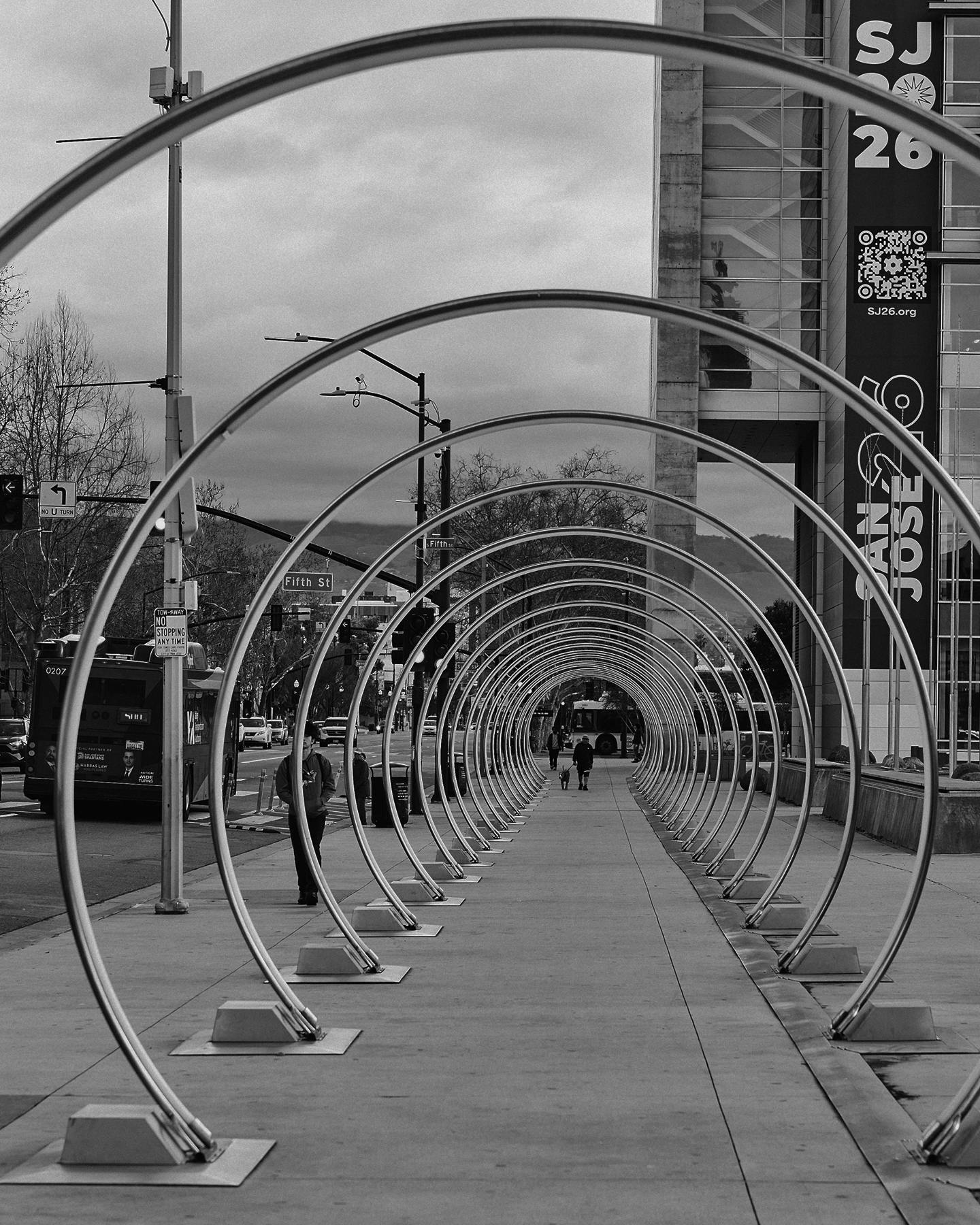 walk way with metal arches