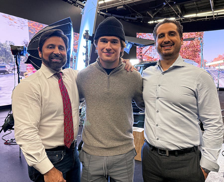 three men standing together
