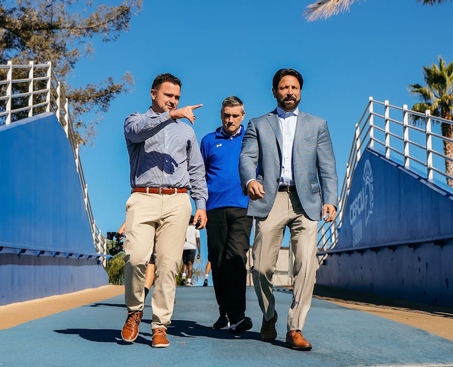 three men walking