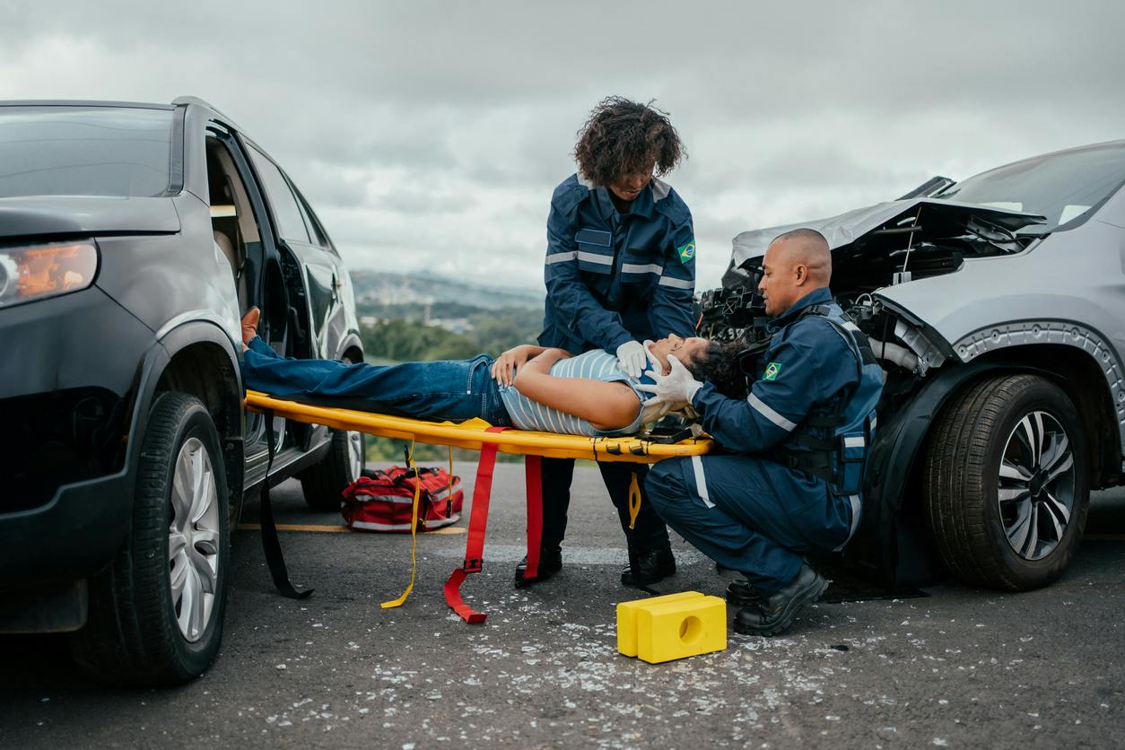 woman getting taken out of the car