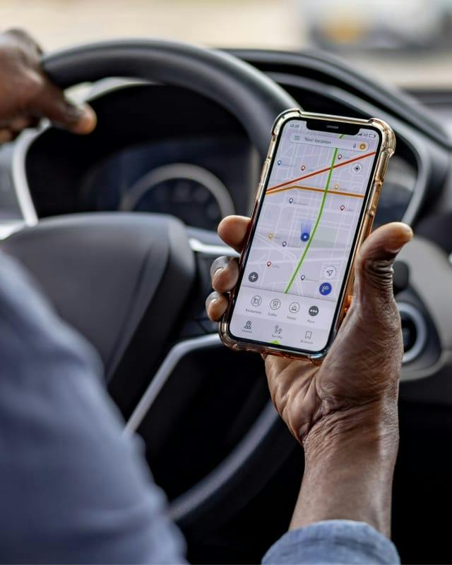 man navigating on phone