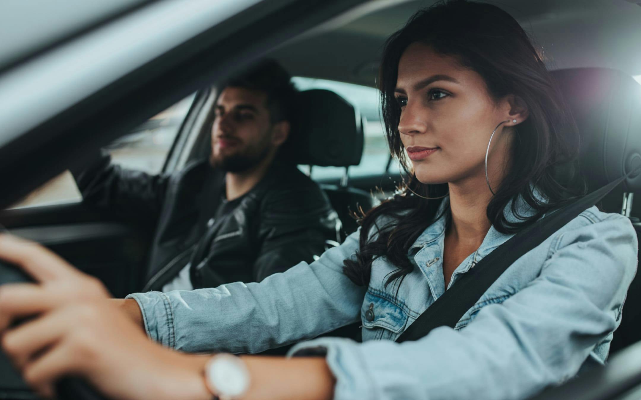 man and woman in car