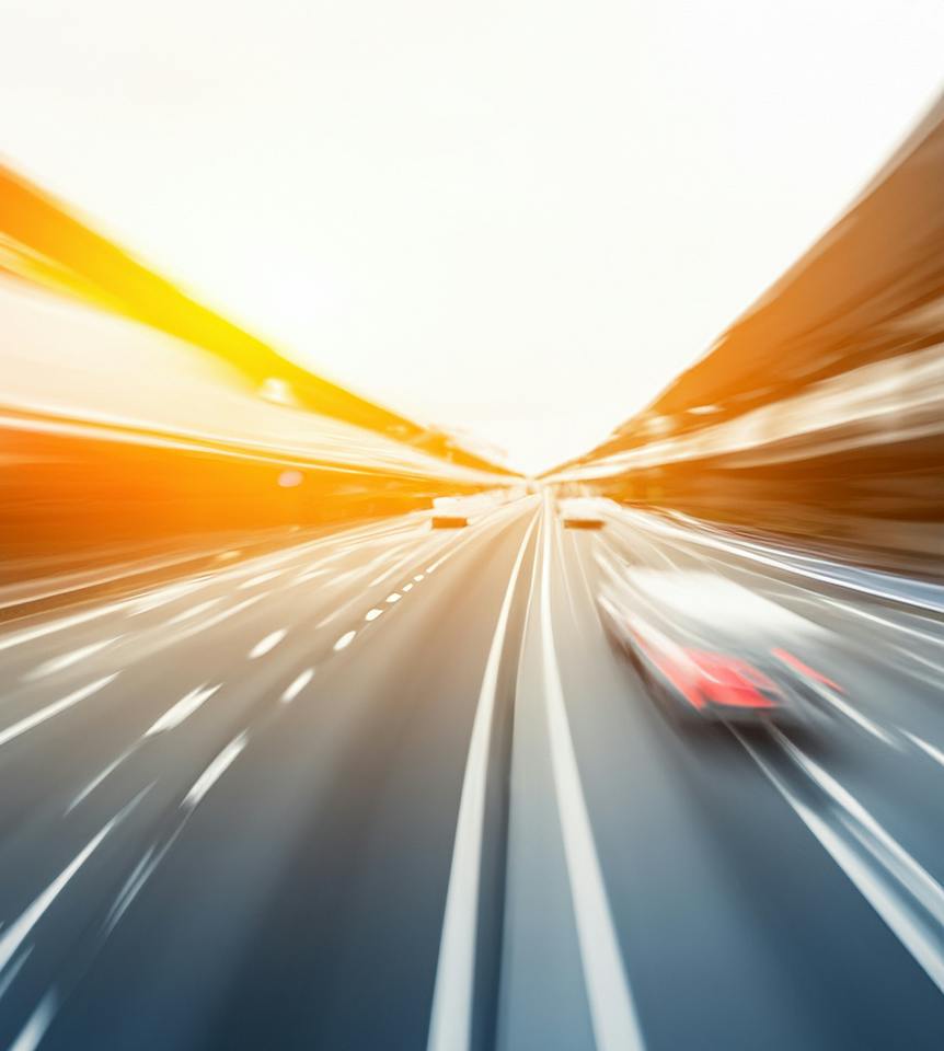 blurred cars driving on a freeway