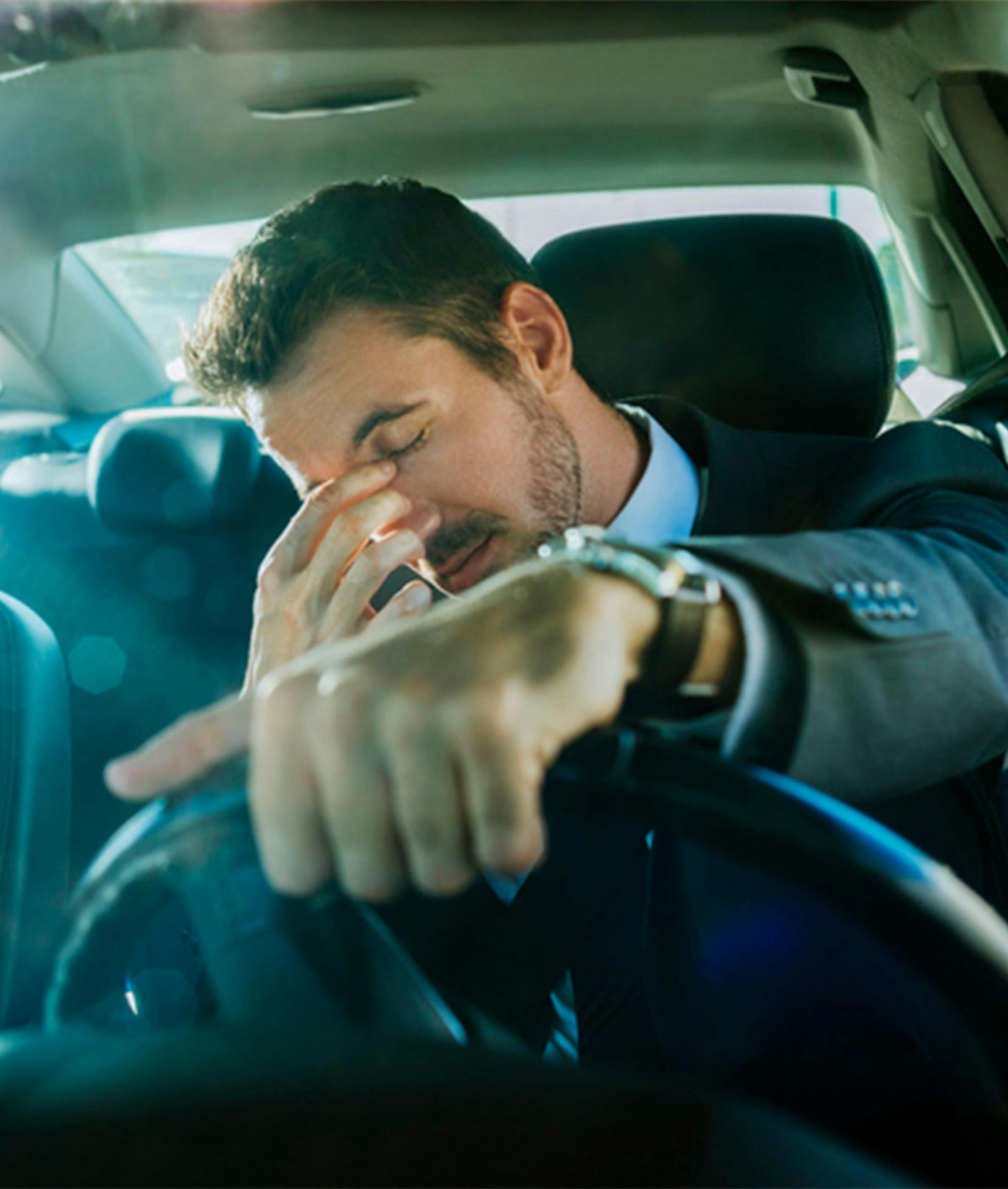 man holding his head