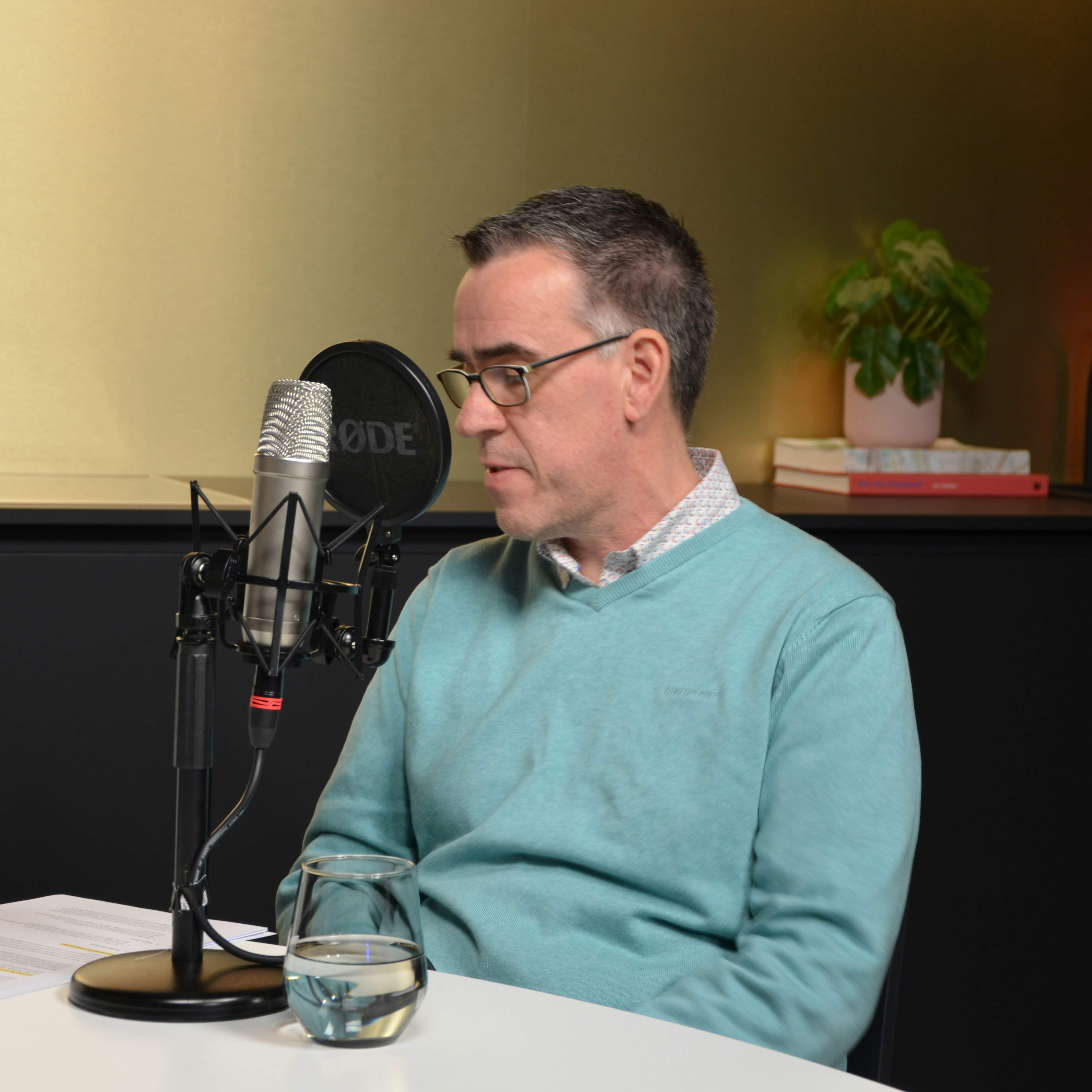 One person participating in a podcast recording.