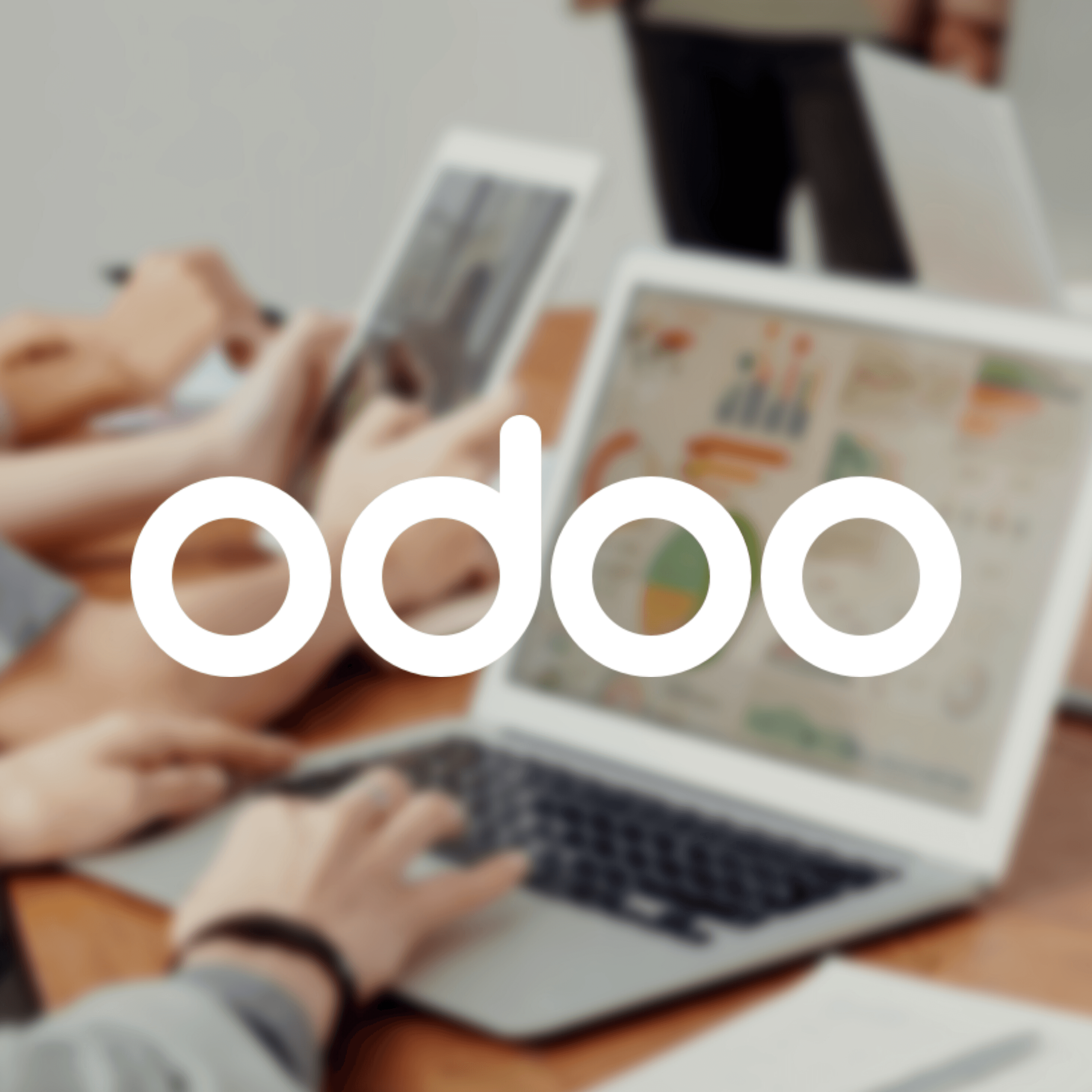A person typing on their computer with the Odoo logo