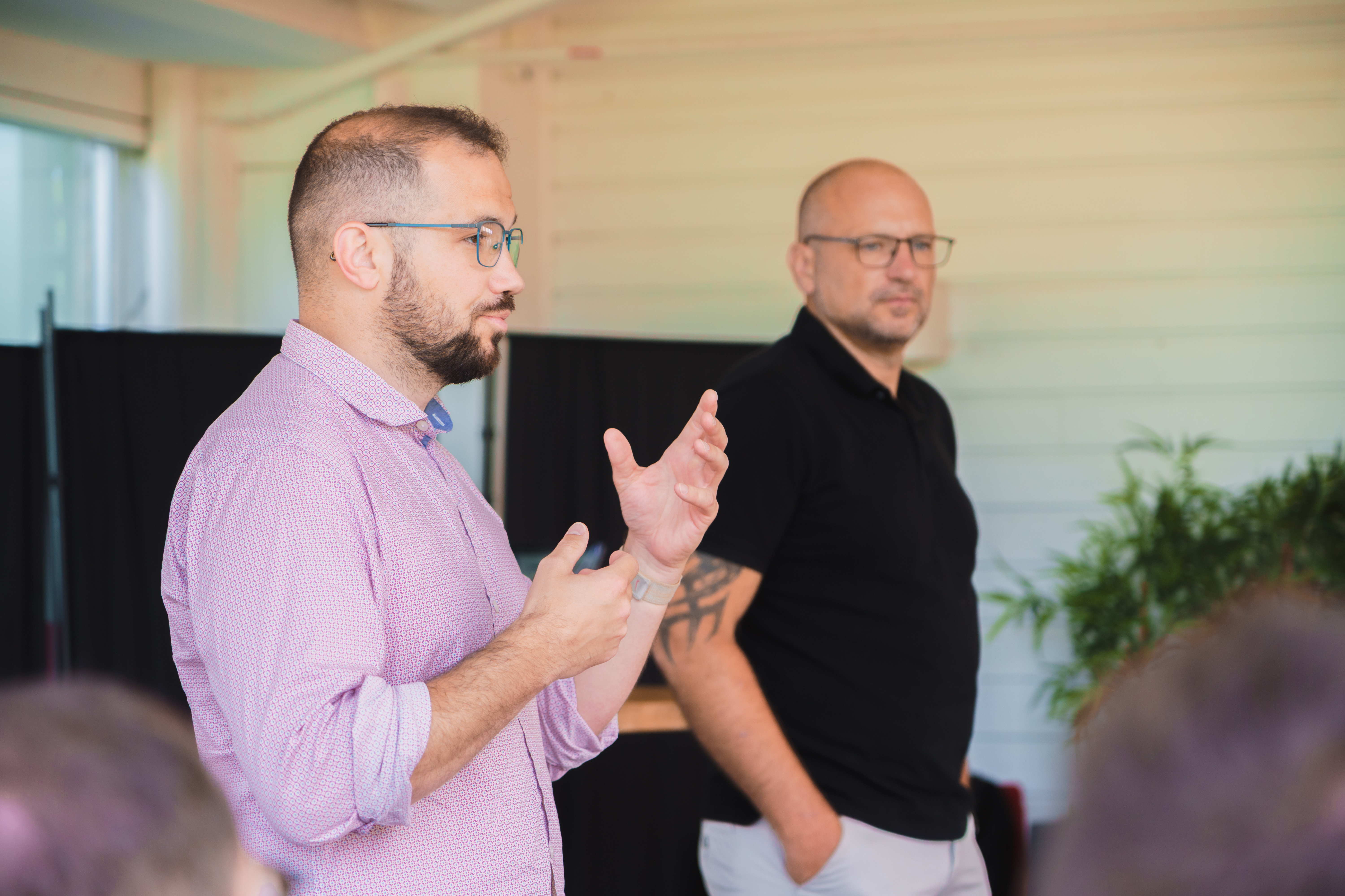 Photo of William and Alex at a meeting