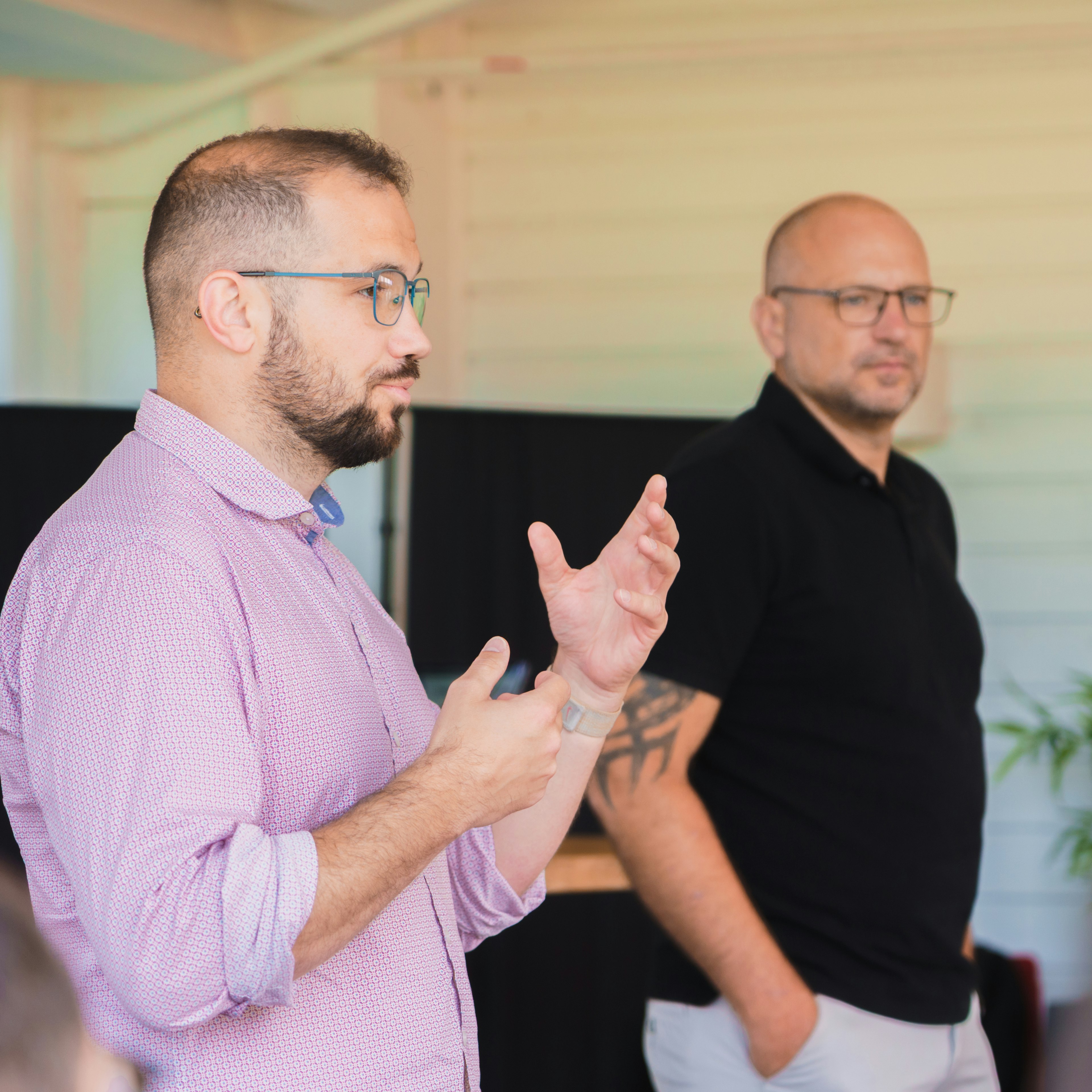 Photo of William and Alex at a meeting