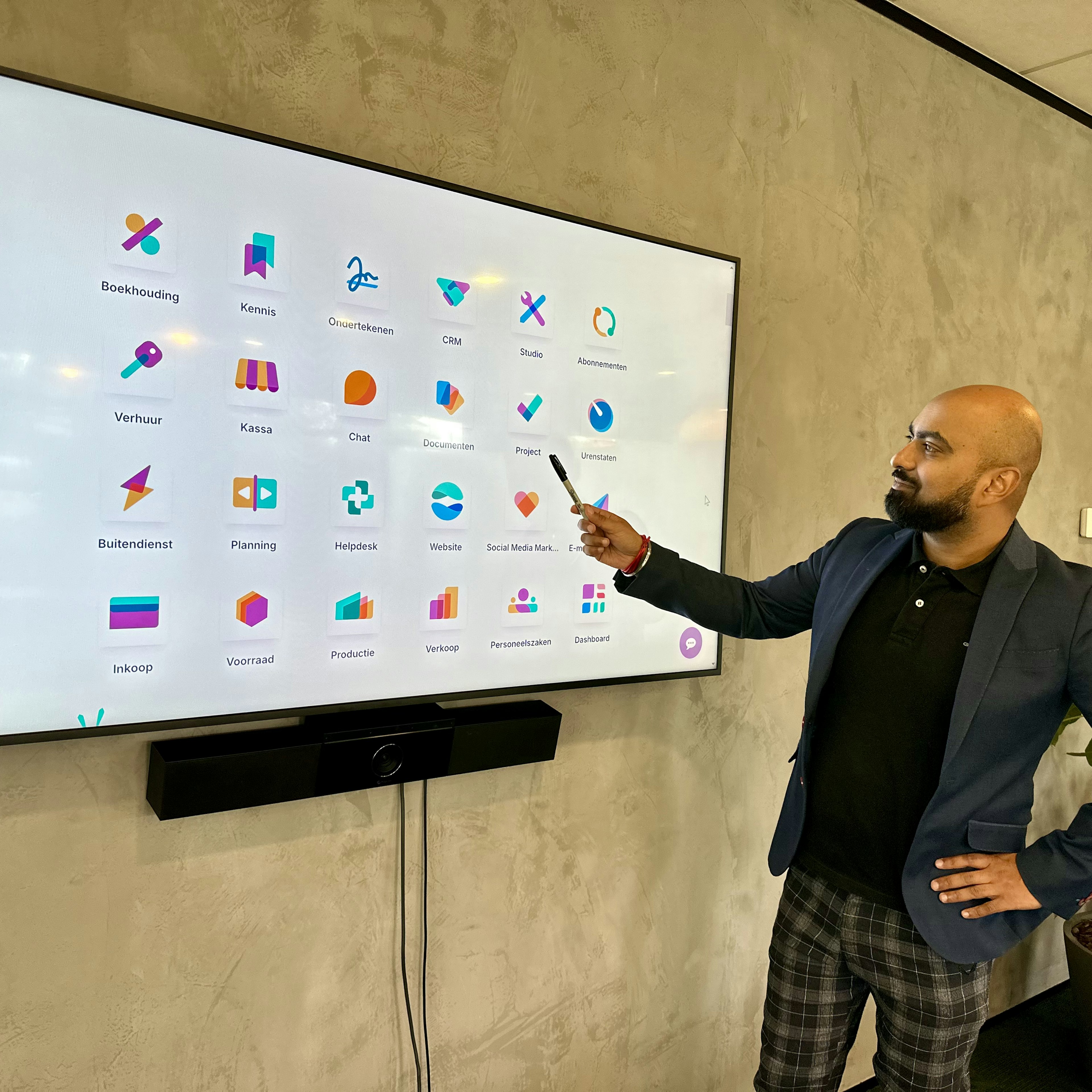 managing director netherlands in front of odoo screen