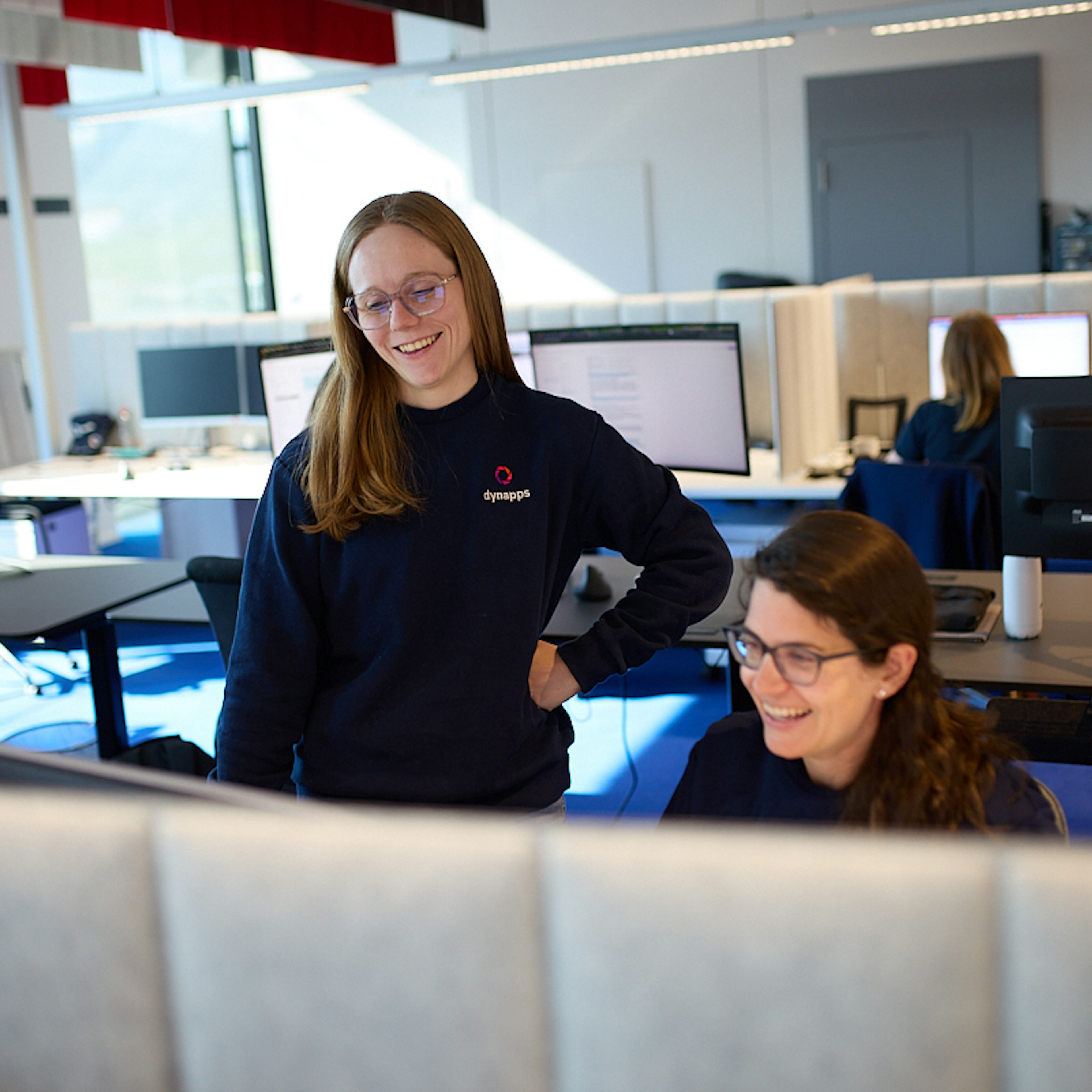 Team member talking & smiling