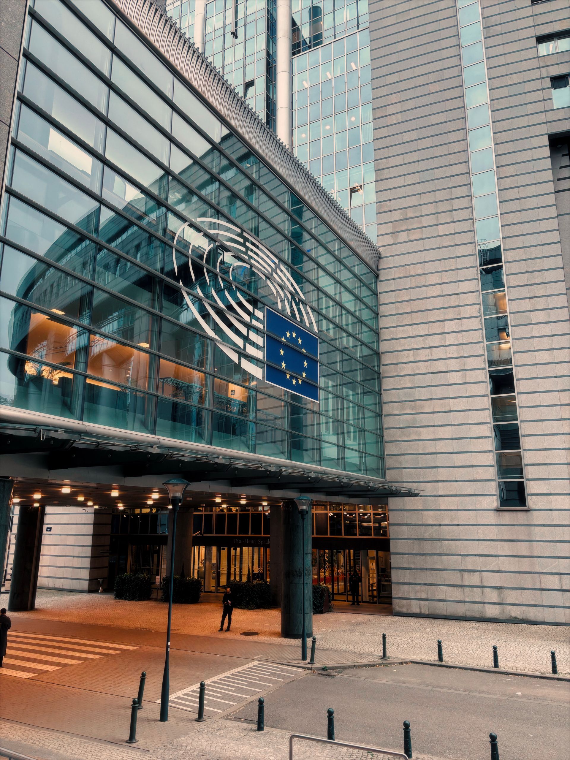 European Parliament building in Brussels with the EU flag