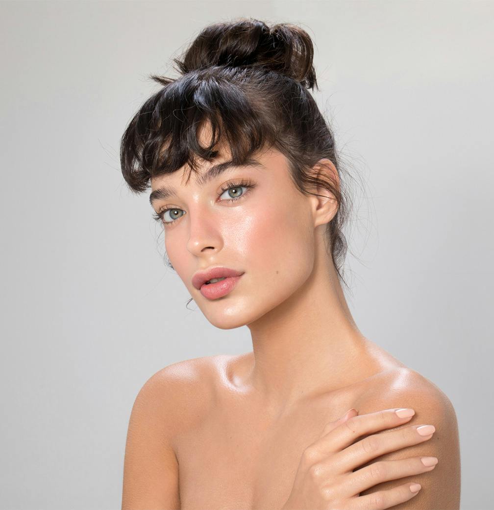 woman with hair in bun