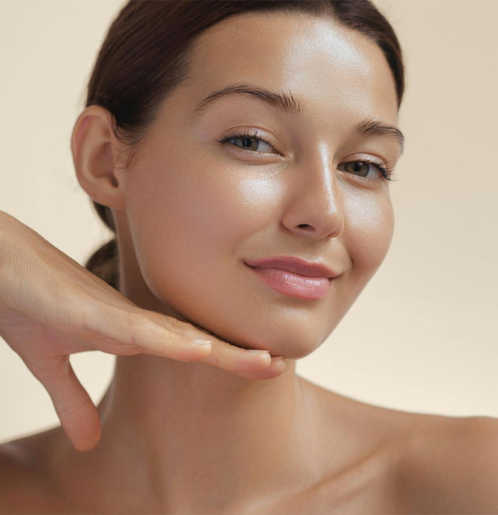 woman with chin resting on hand