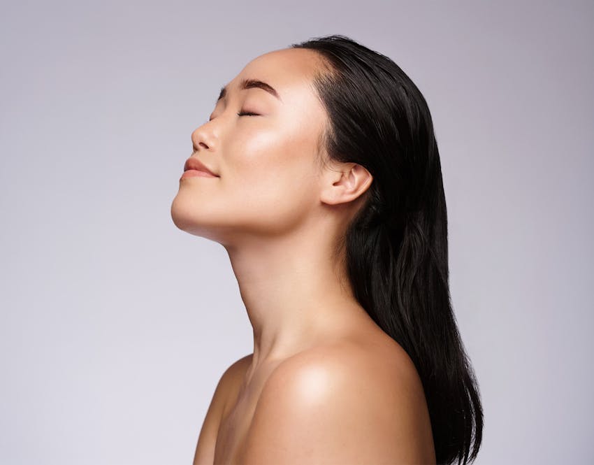 womans side profile looking up
