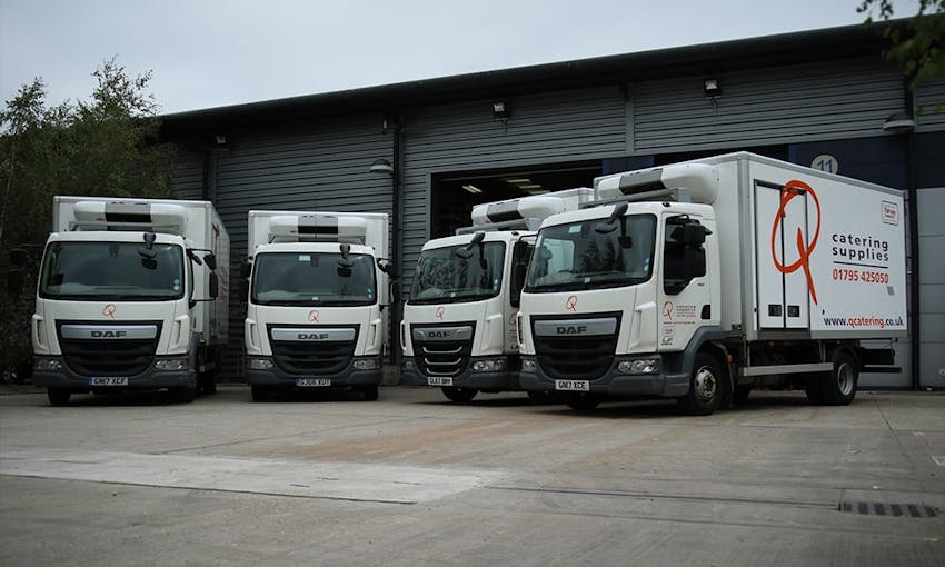 Q Catering Lorries Parked Up outside Warehouse 