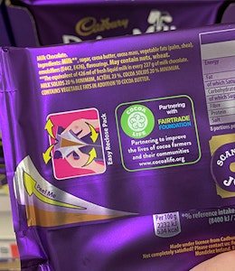 Ingredient list on the back of purple cadburys chocolate bar 