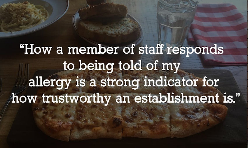 "how a member of staff responds to being told of my allergy is a strong indicator for how trustworthy an establishment is" quote on a darkened background of a flatbread pizza