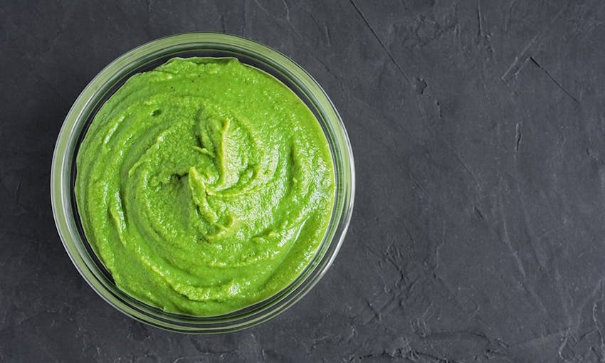 a small bowl of green wasabi 