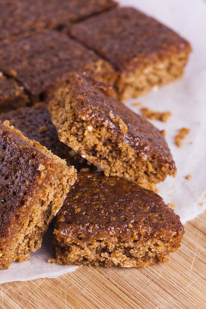 Gooey parkin cake chopped up and stacked on top of each other 